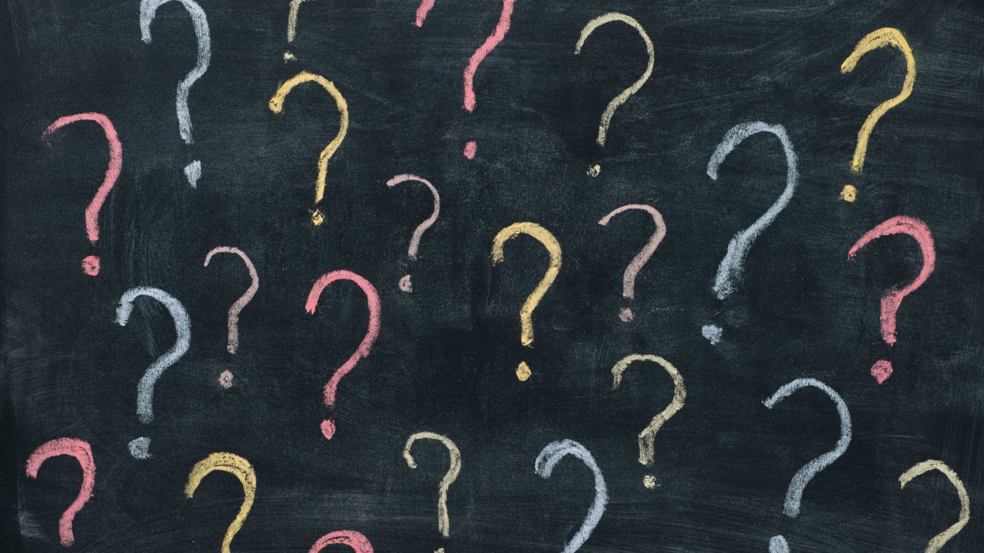 Woman in white dress in sunset wheat field representing FAQs about therapy at Full Bloom Counseling Denver